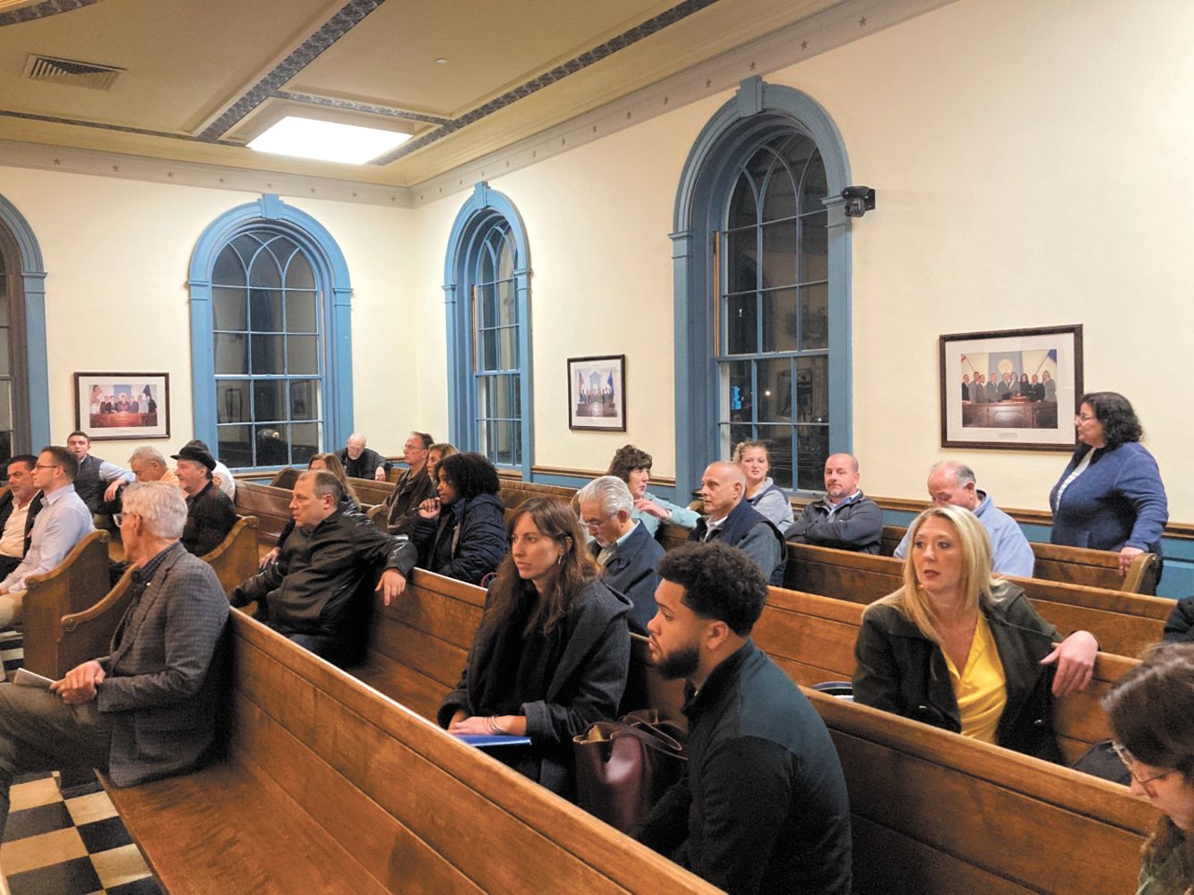 FILING IN: Residents came to City Council chambers Thursday night to discuss the resolution on pallet shelters that was sponsored by Councilman Matthew Reilly and Councilwoman Nicole Renzulli. The resolution called for Gov. Dan McKee to abandon plans for placing pallet shelters at Cranston’s Pastore Center. (Herald photo)